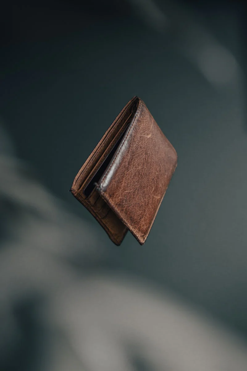 Lost Other property — Brown bifold wallet, initials JM
